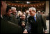 El Presidente George W. Bush les da la mano a miembros de la audiencia tras sus declaraciones ante la Cámara de Comercio Hispana de los Estados Unidos sobre la política con respecto al Hemisferio Occidental el lunes, 5 de marzo de en Washington, D.C. Foto por Paul Morse de la Casa Blanca. 