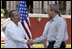 El Presidente George W. Bush le estrecha la mano al Presidente de México, Felipe Calderón, durante la ceremonia de llegada, con la que se les dio la bienvenida al Presidente y la señora Bush al país el martes, 13 de marzo de 2007. El Presidente Calderón le dijo al Presidente Bush, "Señor Presidente, no tengo duda de que juntos, nuestros gobiernos avanzarán en la generación de nuevas oportunidades de bienestar y de prosperidad para nuestras naciones. Sean ustedes muy bienvenidos a México". Foto de Paul Morse de la Casa Blanca