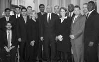 Secretary of State Colin Powell ('72-73) with the White House Fellows and Program Director Jocelyn White.