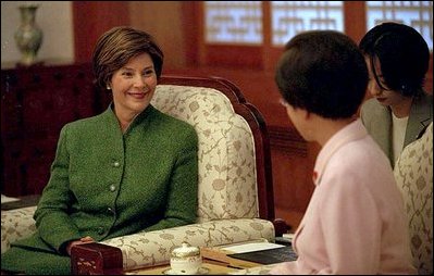 Mrs. Bush talks with Madame Lee Hee-ho, First Lady of the Republic of Korea, during a tea at Chong Wa Dae (The Blue House) Wednesday, February 20, 2002 in Seoul, Korea. White House photo by Susan Sterner.