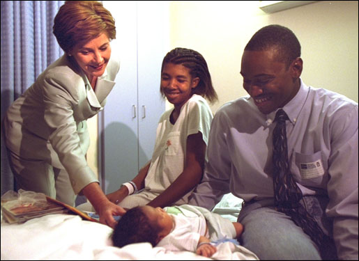  Laura Bush visits with parents Ronnie and Chakeiva Collins, a couple from Plant City, Fla. and their 2-day-old son at Tampa General Hospital on Tuesday, October 1. Mrs. Bush presented the new parents a copy of the Healthy Start, Grow Smart magazine series that provides parents with critical information about the early development, health, nutrition and safety needs of babies and toddlers. White House photo by Susan Sterner.