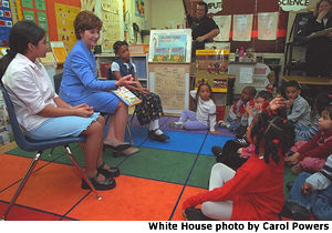 Photograph of First Lady Laura Bush reading to students at Cesar Chavez Elementary School. White House photo by Carol Powers