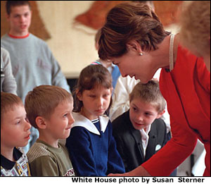 Photo of Mrs. Bush with children. White House photo by Susan Sterner.