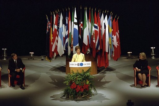 Mrs. Bush spoke to country ambassadors about the importance of educating the world's children at the Organization for Economic Cooperation and Development Forum, May 14, 2002. "Education opens the door of hope to all the world's children," said Mrs. Bush White House photo by Susan Sterner.