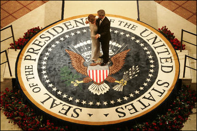 President George W. Bush and Laura Bush dance on the Presidential Seal at the Commander-in-Chief Inaugural Ball at the National Building Museum in Washington, D.C., Thursday, Jan. 20, 2005.