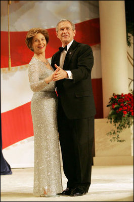 President George W. Bush and Laura Bush dance for the crowd during the Constitution Ball held at the Washington Hilton, Washington, D.C., Thursday, Jan. 20, 2005.