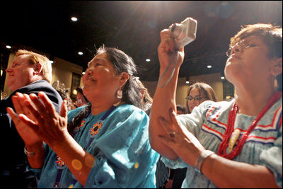 People cheer for Laura Bush after her remarks at the Heard Museum in Phoenix, Ariz., April 26, 2005.