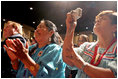 People cheer for Laura Bush after her remarks at the Heard Museum in Phoenix, Ariz., April 26, 2005.