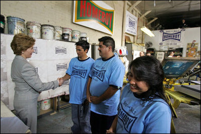 Laura Bush meets members of the Homeboy Industries program in Los Angeles during her tour of the facility April 27, 2005.