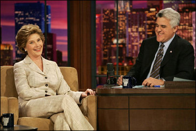 Laura Bush talks with Jay Leno of The Tonight Show during a taping of the show in Los Angeles April 26, 2005.