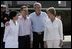President George W. Bush and Colombian President Alvaro Uribe pose with their wives, U.S. first lady Laura Bush (R) and Colombia first lady Lina Moreno at the President's Central Texas ranch in Crawford, Texas, on August 4, 2005.
