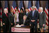 President George W. Bush is seen Thursday, Dec. 1. 2005 in the Eisenhower Executuive Office Building in Washington, as he signs H.R. 4145, to Direct the Joint Committee on the Library to Obtain a Statue of Rosa Parks, which will be placed in the US Capitol's National Statuary Hall. The President is joined by, from left to right, U.S. Sen. Richard G. Lugar, R-Ind., U.S. Secretary of Housing and Urban Development Alphonso Jackson, Mrs. Laura Bush, U.S. Secretary of State Condoleezza Rice, U.S. Rep. Jesse Jackson Jr., D-Ill., U.S. Sen. John Kerry, D-Mass., and U.S. Sen. Thad Cochran, R-Miss.
