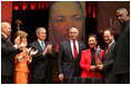 Secretary of State Colin Powell and his wife Alma are accompanied by President George W. Bush and Mrs. Laura Bush while the Powell's received the John Thompson Legacy of a Dream Award from Georgetown University during the University's "Let Freedom Ring" celebration honoring Dr. Martin Luther King, Jr. at the Kennedy Center for the Performing Arts on Monday, January 17, 2005.