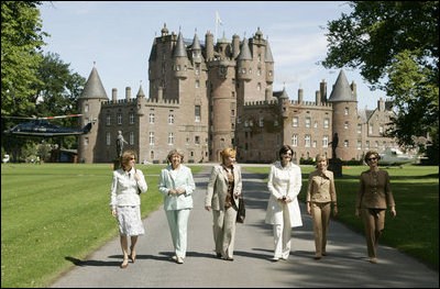 Spouses of G8 leaders leave Glamis Castle in Auchterarder, Scotland, Thursday, July 7, 2005. With Mrs. Bush are, from left: Margarida Sousa Uva of Portugal; Sheila Martin of Canada; Lyudmila Putina of Russia; Cherie Blair of England, and Doris Schroeder-Koepf of Germany.