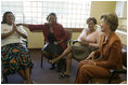 Laura Bush meets with women from Mothers to Mothers-to-Be in Cape Town, South Africa, Tuesday, July 12, 2005. The program provides support to HIV-positive women during their pregnancy.
