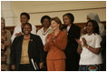 Laura Bush stands with U.S. Ambassador to South Africa Jendayi Frazer, left, during her visit to Centre for the Book, an institution established to create a culture of literacy in South Africa, Tuesday, July 12, 2005, in Cape Town.