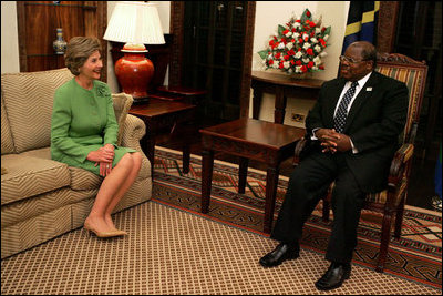 Laura Bush meets with President Benjamin Mkapa at the Presidential Residence in Dar Es Salaam, Tanzania, Wednesday, July 13, 2005. Mrs. Bush is visiting Africa to highlight U.S. aid and partnerships promoting programs for girls' education, HIV/AIDS awareness and women's empowerment.