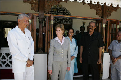 Laura Bush visits with President Amani Abeid Karume, pictured in black, at right, in Zanzibar, Tanzania, Thursday, July 14, 2005.