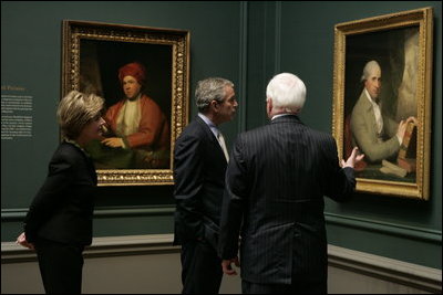 President and Mrs. Bush receive a tour of the Gilbert Stuart Exhibition at the National Gallery of Art, from gallery director Earl "Rusty" Powell III, Monday, July 25, 2005 in Washington.