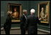 President and Mrs. Bush receive a tour of the Gilbert Stuart Exhibition at the National Gallery of Art, from gallery director Earl "Rusty" Powell III, Monday, July 25, 2005 in Washington.