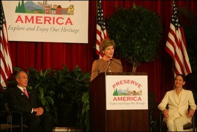 Laura Bush addresses an audience July 26, 2005 at a Preserve America neighborhoods event at the East Literature Magnet School in Nashville, Tennessee.