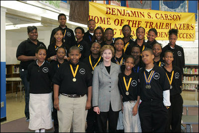 Laura Bush attends the Helping America's Youth Event at the Benjamin S. Carson Honors Preparatory School, Atlanta, Georgia, with debate class, March 9, 2005.