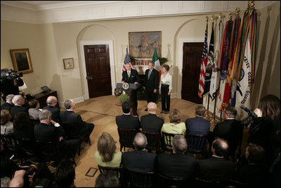 Irish Taoiseach Bertie Ahern delivers remarks before presenting President George W. Bush with the traditional bowl of shamrocks during a St. Patrick's Day Shamrock Ceremony in the Roosevelt Room Thursday, March 17, 2005.