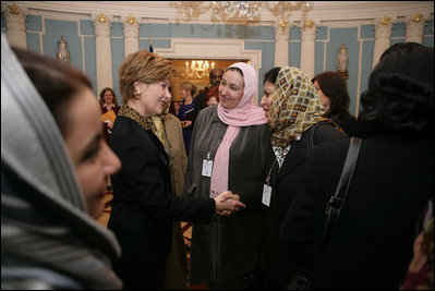 Laura Bush greets Afghan Ministers during her visit to the State Department for an International Women's Day Forum in Washington, D.C., Tuesday, March 8, 2005.
