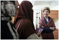 Laura Bush talks with female students in the newly built National Women’s Dormitory on the campus of Kabul University Wednesday, March 30, 2005, in Kabul, Afghanistan. The women’s dormitory was built to provide a safe place for young women to live while pursuing studies away from their families.
