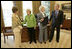 President George W. Bush and Laura Bush meet with Barbara de Marneff and Stephanie Copeland of Edith Wharton Restoration in Massachusetts, in the Oval Office Monday, May 2, 2005. The two women are two of the recipients of the 2005 Preserve America Presidential Award.