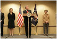 Accompanied by Laura Bush and Secretary of State Condoleezza Rice, President George W. Bush addresses U.S. Embassy families and staff in Latvia Saturday, May 7, 2005. Pictured at left are U.S. Ambassador to Latvia, Catherin T. Bailey, and her husband, Irving Bailey II.