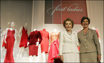 Laura Bush and Nancy Reagan appear at the opening Thursday, May 12, 2005, of The Heart Truth's First Ladies Red Dress Collection exhibit at the John F. Kennedy Center for the Performing Arts in Washington D.C.