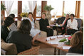 Laura Bush talks with Palestinian women about women's rights at the Jericho Intercontinental Hotel in Jericho, Sunday, May 22, 2005.