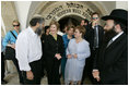 Laura Bush tours the Western Wall in Jerusalem with Rabbi Shmuel Rabinowitz; Gila Katsav, wife of Israeli President Moshe Katsav, center; and Mordechai Suli Eliav, manager of The Western Wall Heritage Foundation, May 22, 2005.