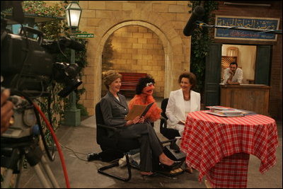 Laura Bush and Suzanne Mubarak appear as guests on the Egyptian children's television program "Alam Simsim" with the show's character Khokka at Studio Misr in Cairo, Egypt, Monday, May 23, 2005.