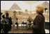 Press Secretary Susan Whitson talks with Laura Bush between television interviews in front of the Giza Pyramids in Giza, Egypt, Monday, May 23, 2005.