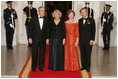 President George W. Bush and Laura Bush welcome the Prince of Wales and Duchess of Cornwall upon their arrival to the White House, Wednesday evening, Nov. 2, 2005.