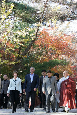 President George W. Bush and Laura Bush arrive at the Bulguksa Temple Thursday, Nov. 17, 2005, in Gyeongju, Korea with Korean President Moo Hyun Roh and his wife Yang-Sook Kwon.
