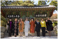 Other spouses of APEC leaders join Laura Bush Friday, Nov. 18, 2005, for a group photo at the Beomeosa Temple in Busan, Korea.