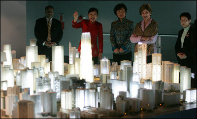Mrs. Bush is joined by Mrs. Sarah Randt, wife of U.S. Ambassador to China Clark Randt, as they tour the Beijing Urban Planning Museum in Beijing Sunday, Nov. 20, 2005.