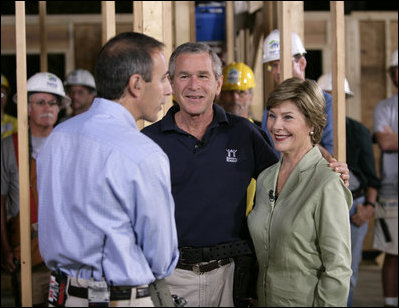 NBC "Today Show" host Matt Lauer talks with President George W. Bush and Laura Bush Tuesday, Oct. 11, 2005, on the construction site of a Habitat for Humanity home in Covington, La., a hurricane-devastated town just north of New Orleans where the nonprofit is building houses for those displaced by Katrina.
