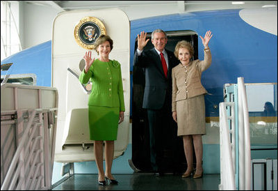 President George W. Bush, Laura Bush and Nancy Reagan wave after touring the plane that served as Air Force One for President Ronald Reagan and six other Presidents from 1973-2001at the Ronald Reagan Presidential Library in Simi Valley, California, Friday, Oct. 21, 2005.