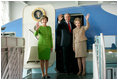 President George W. Bush, Laura Bush and Nancy Reagan wave after touring the plane that served as Air Force One for President Ronald Reagan and six other Presidents from 1973-2001at the Ronald Reagan Presidential Library in Simi Valley, California, Friday, Oct. 21, 2005.