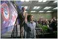 President George W. Bush and Laura Bush attend the White House Conference on Helping America's Youth, Thursday, Oct. 27, 2005 at Howard University in Washington.