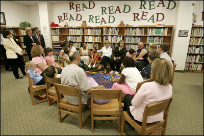 Laura Bush meets Thursday, Sept. 8, 2005 with families from New Orleans, displaced last week as a result of Hurricane Katrina, at the Greenbrook Elementary School in DeSoto County, Miss. Greenbrook Elementary School has enrolled the most displaced students among the DeSoto County schools in Mississippi.