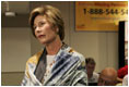 Laura Bush talks with the press during her visit to the National Center for Missing & Exploited Children in Alexandria, Va., Friday, Sept. 16, 2005.