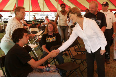 Laura Bush meets with people while visiting a medical and food distribution site, Tuesday, Sept. 27, 2005 in Biloxi, Miss.