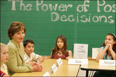 Mrs. Laura Bush listens to students during a visit to Bel Air Elementary School in Albuquerque, N.M., Monday, April 3, 2006, during a lesson called Protecting You/Protecting Me, to teach the prevention of substance and alcohol abuse. Protecting You/Protecting Me is a curriculum developed and supported by Mothers Against Drunk Driving, for children in grades 1-5, focusing on the effects of alcohol on the developing brain during the first 21 years of life.