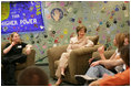 As part of the Helping America's Youth initiative, Mrs. Laura Bush visits the Preferred Family Healthcare Adolescent Substance Abuse Rehabilitation Center, and talks with 18 year-old Dalton Fox about the progress of her recovery from substance abuse addiction on Tuesday, April 4, 2006, in St. Louis, Mo. PFH specializes in individual customer care, by focusing on strengthening individual skills, attitudes, and behaviors that maximizes the opportunity for each person to achieve and maintain recovery.