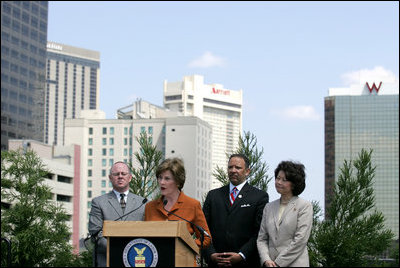 Mrs. Laura Bush, flanked by Mark Sanders, GM of Marriott Hotels, Marc Morial, President and CEO of the National Urban League, and Labor Secretary Elaine Chao, announces a $20 million dollar grant to the National Urban League in New Orleans, La., Monday, April 10, 2006, for their Youth Empowerment program to help at-risk youth find stable employment, as part of the Helping America's Youth initiative.